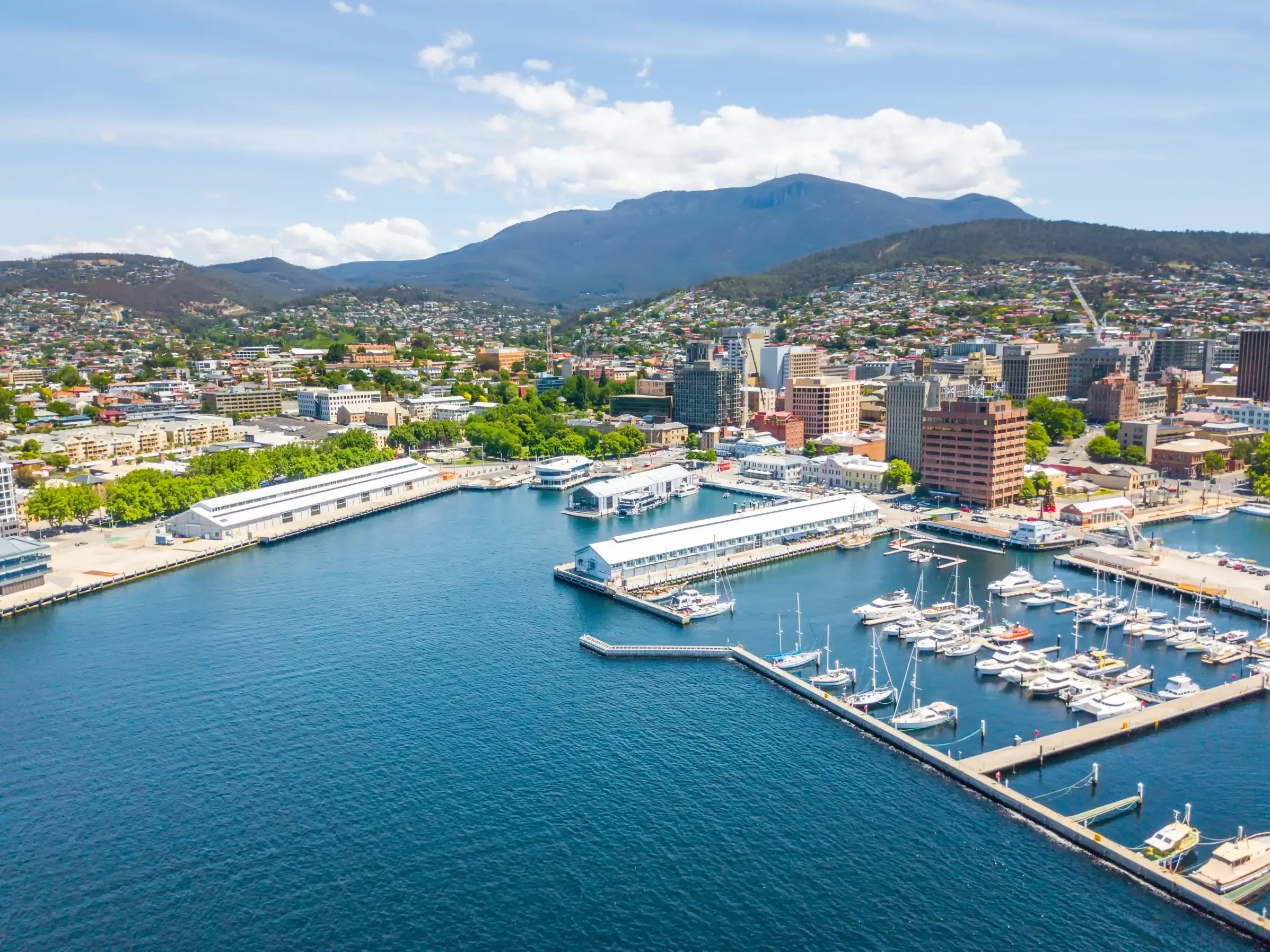 Aerial view of Hobart waterfront marina with Mount Wellington