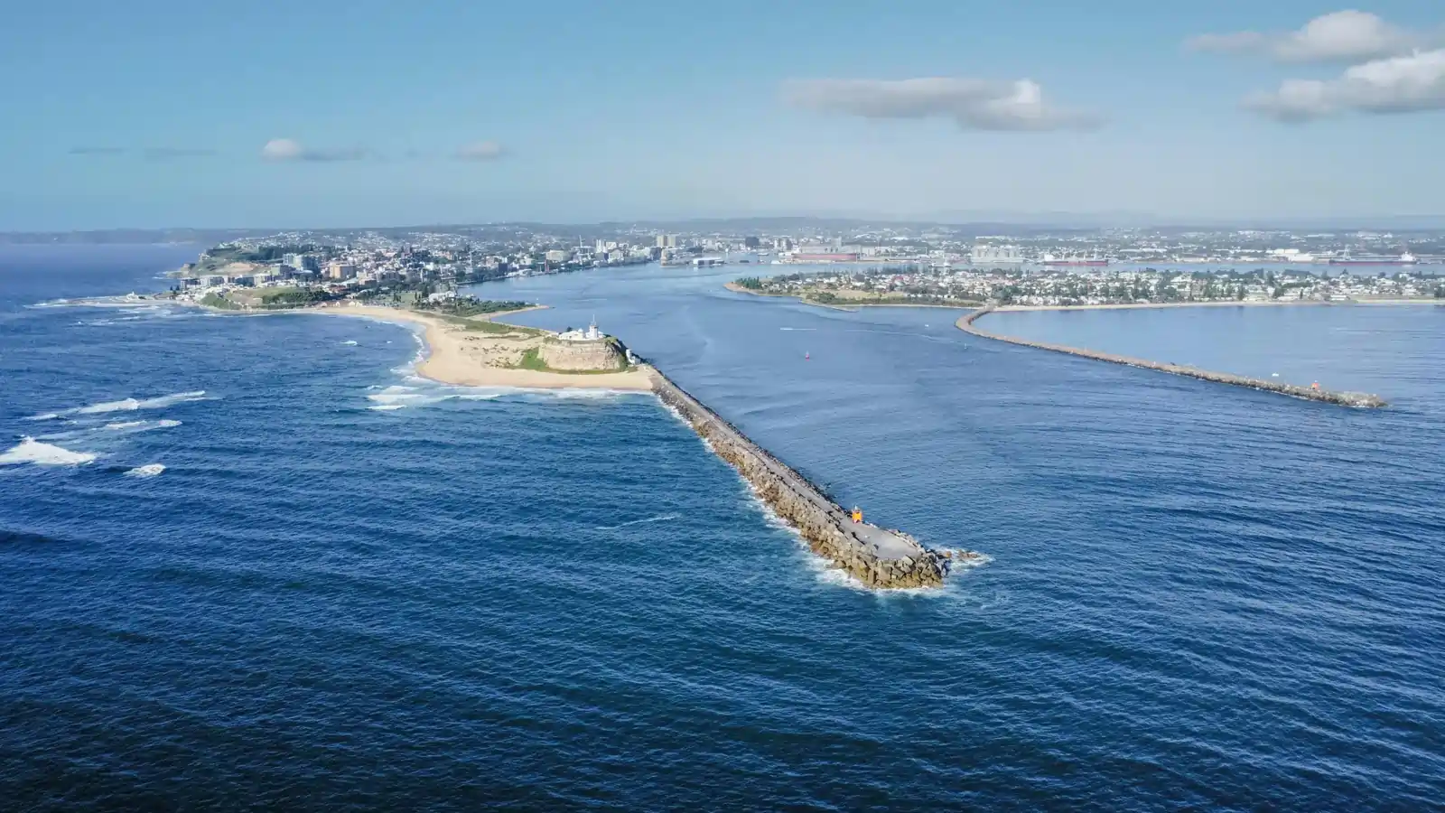 Aerial view of Newcastle breakwater, lighthouse, and harbor entrance